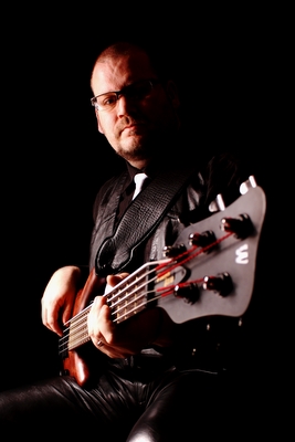 Kris Hudson-Lee with Warwick Thumb Bass... workin' the leathers!